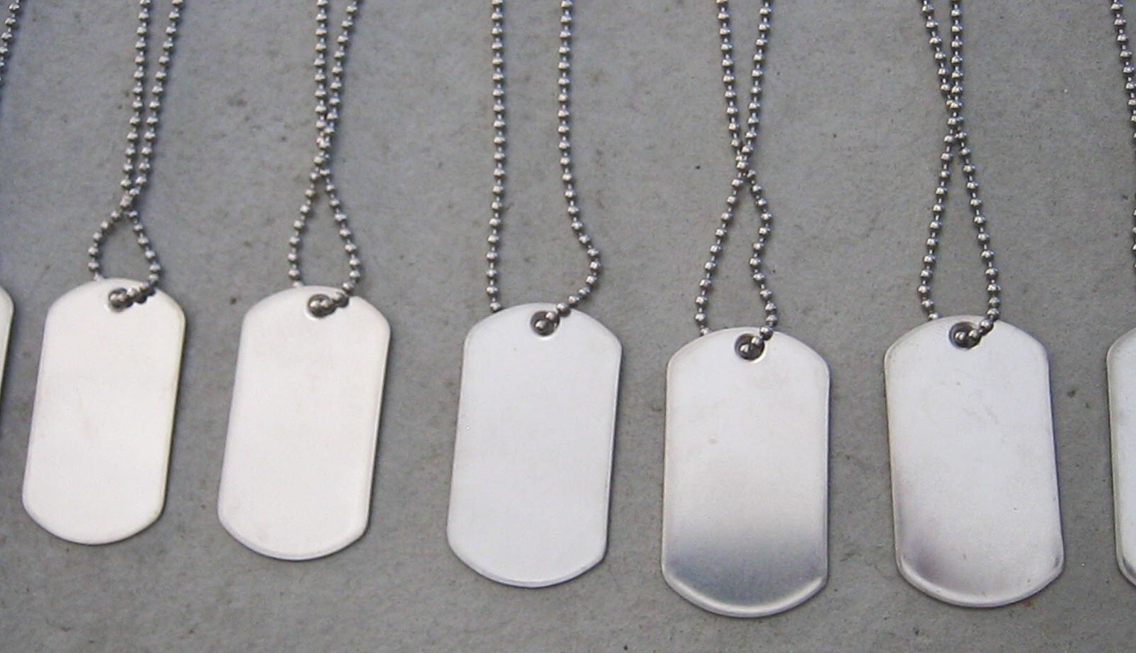SPECIALTY DOG TAG COLLECTION OF INFANTRY COSCOM SPECIAL OPS AIRBORNE, LOT OF 10