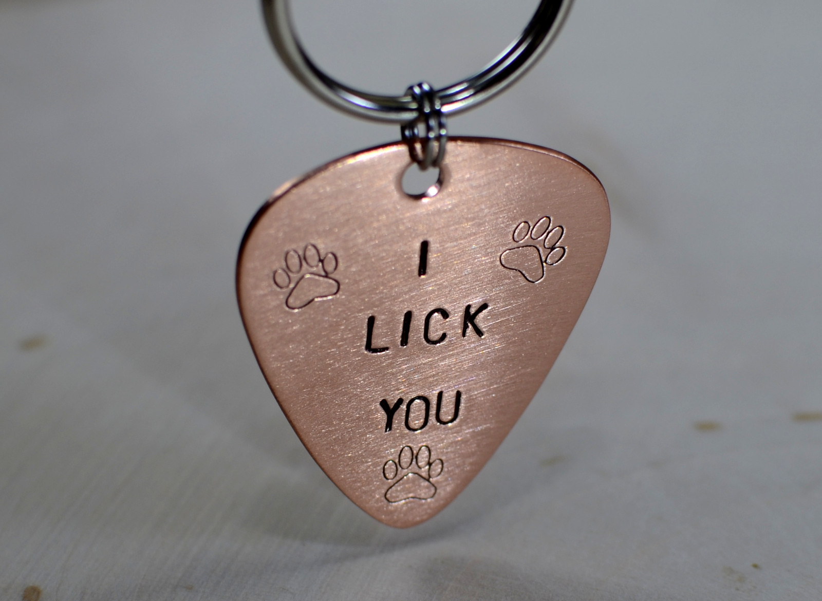 Copper guitar pick dog tag for you to customize front and back